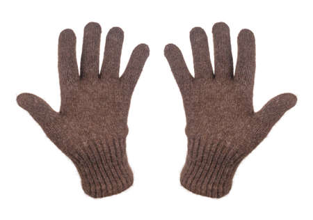 Warm woolen winter gloves isolated on white backgroundの写真素材