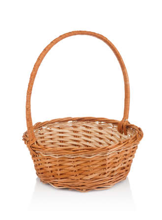 Wicker basket close up isolated on white backgroundの写真素材