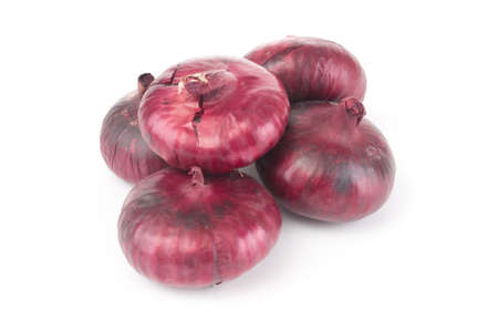 Fresh red onion bulbs isolated on white backgroundの写真素材