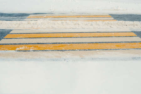 Pedestrian crossing under snow cover in winterの写真素材