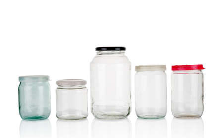 Few empty glass jars isolated on white backgroundの写真素材
