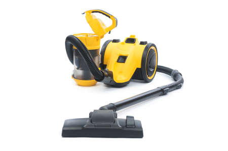 Yellow vacuum cleaner with dust filter isolated on white backgroundの写真素材