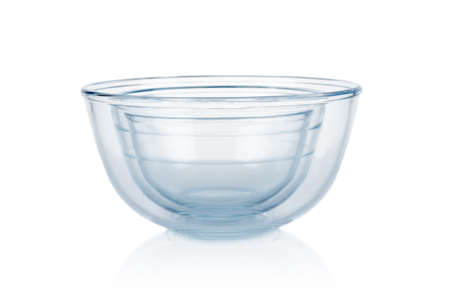 Empty glass food bowls isolated on white backgroundの写真素材