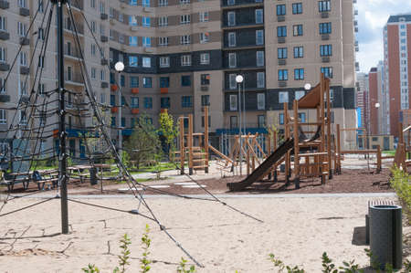 Playground at summer time in a city yardの写真素材
