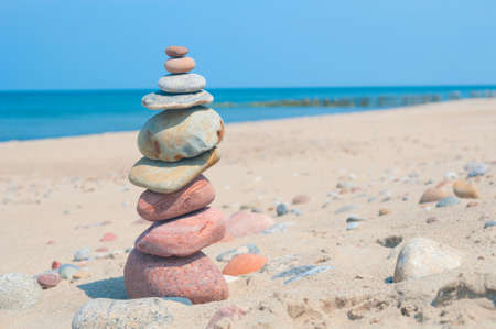 Stones stack balance tranquil concept on a coastlineの写真素材