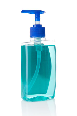 Soap dispenser bottle close up on white backgroundの写真素材