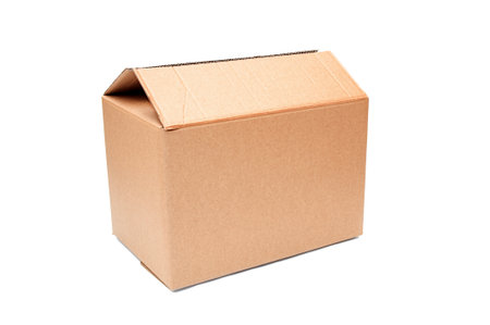 Closed cardboard box close up isolated on a white backgroundの写真素材