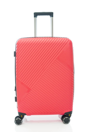 Red plastic travel bag close up on white backgroundの写真素材