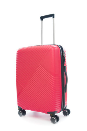 Red plastic travel bag close up isolated on white backgroundの写真素材