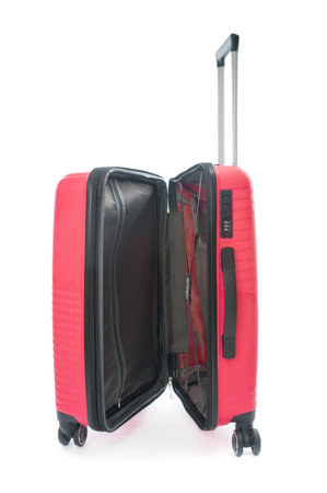 Red open travel bag close up isolated on white backgroundの写真素材