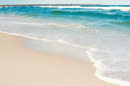 Soft sea waves on a sandy beach. vacation conceptの写真素材