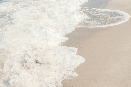Soft sea waves on a sandy beach. vacation conceptの写真素材