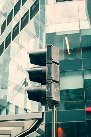 traffic light close up on modern building backgroundの写真素材