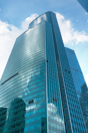 Modern skyscrapers of business center in downtown on blue sky background