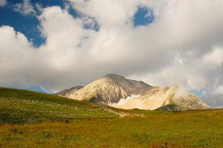 Mountain landscape, mountain valley and cloudy skyの写真素材