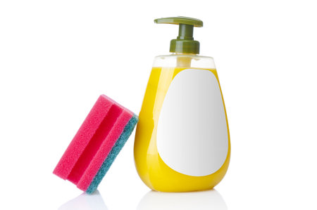 Plastic bottle liquid soap and sponge on a white backgroundの写真素材