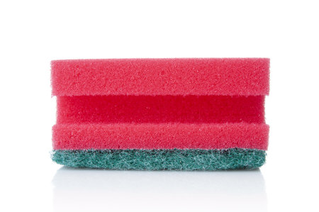 Red sponge close up isolated on a white backgroundの写真素材