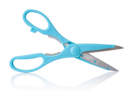 Blue scissors close up isolated on a white backgroundの写真素材