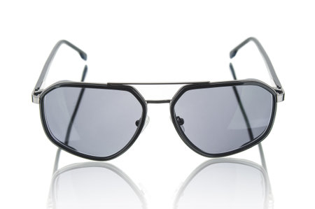 Modern sunglasses close up on a white backgroundの写真素材
