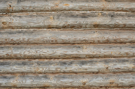 Peasant's wooden house log wall close upの写真素材