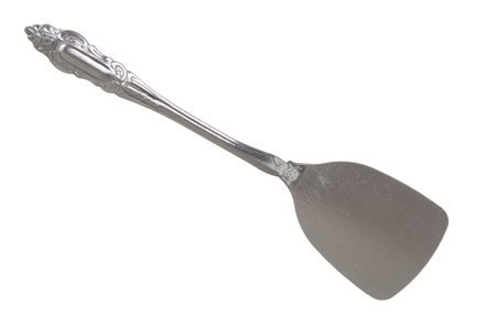 Metallic kitchen spatula isolated on a white backgroundの写真素材