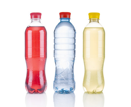 Different soda in plastic bottles on a white backgroundの写真素材