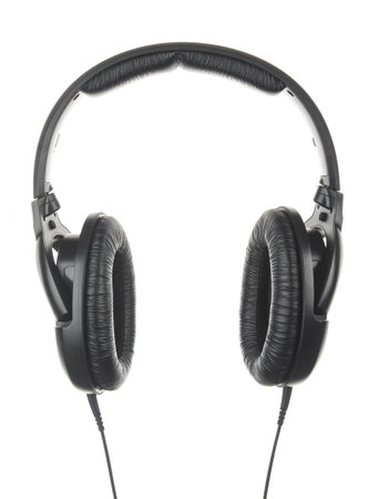 Black headphones with cable close up isolated on white backgroundの写真素材