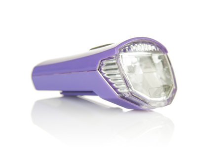 Plastic flashlight for bicycle on a white backgroundの写真素材
