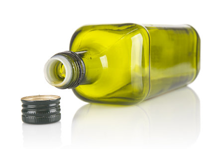 Empty bottle olive oil close up isolated on white backgroundの写真素材