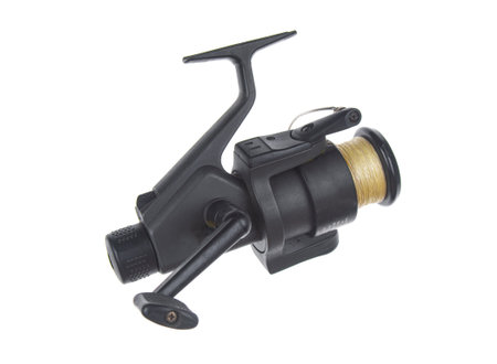 Fishing reel close up isolated on a white backgroundの写真素材