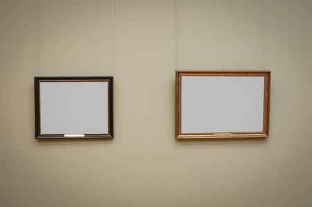 Antique carved picture frames with gray copy space in gallery