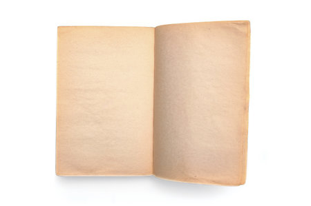 Old antique open book on a white backgroundの写真素材