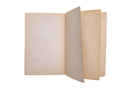 Old antique open book isolated on a white backgroundの写真素材