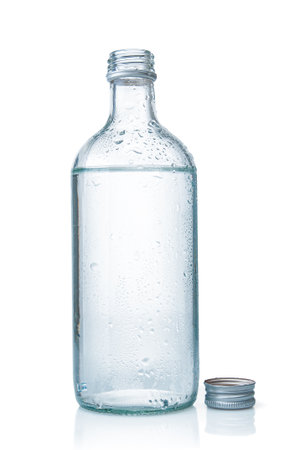 Water glass bottle close up on a white backgroundの写真素材