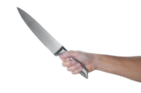Chef kitchen knife in hand close up on a white backgroundの写真素材