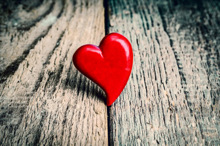 Heart on grunge wooden background. Valentines day cardの写真素材