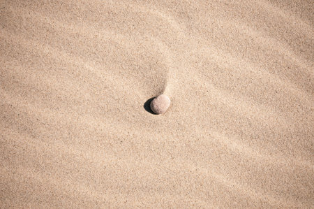 Clean sand with small pebble as background