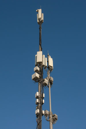 Telecommunication tower of 4G and 5G cellular on blue sky background
