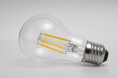 Light bulb close up on a gray backgroundの写真素材