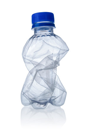 Crumpled plastic bottle isolated on a white backgroundの写真素材