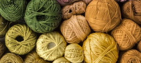 Rainbow colored yarn balls, viewed from above