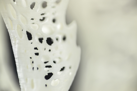 3d printed object close-up, mesh textured abstract background.の写真素材