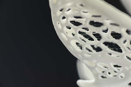 3d printed object close-up, mesh textured abstract background.の写真素材