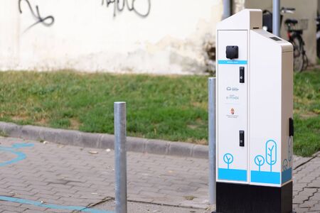 BEKESCSABA, HUNGARY - AUG 24, 2018: Electric car filling station on the street.のeditorial素材