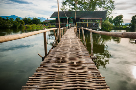 Bamboo walkway leading to the house.のeditorial素材