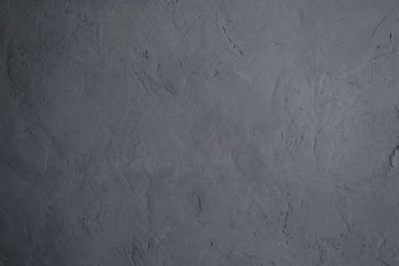 Dark cement wall background and texture. Vintage or grungy background of natural cement or stone old texture as a retro pattern wall.Texture of gray concreteの写真素材
