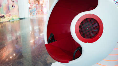 White and red round virtual reality armchair, modern technologies, virtual games.Modern futuristic industrial design.の写真素材
