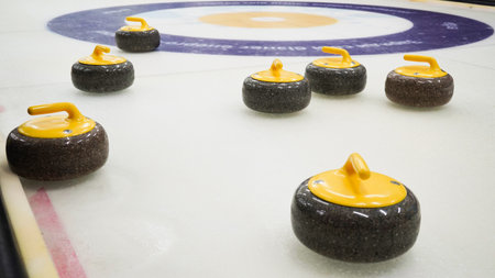 Granite stones for curling on white ice close-up.Winter sport, team game.Curling Clubの写真素材