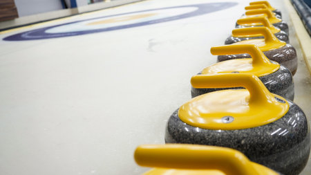 Granite stones for curling on white ice close-up.Winter sport, team game.Curling Clubの写真素材