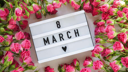 International Women's Day. Concept of greeting banner for international womens day, 8 march. Board...